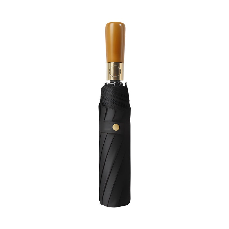 Premium compact umbrella with wood handle and gold hardware